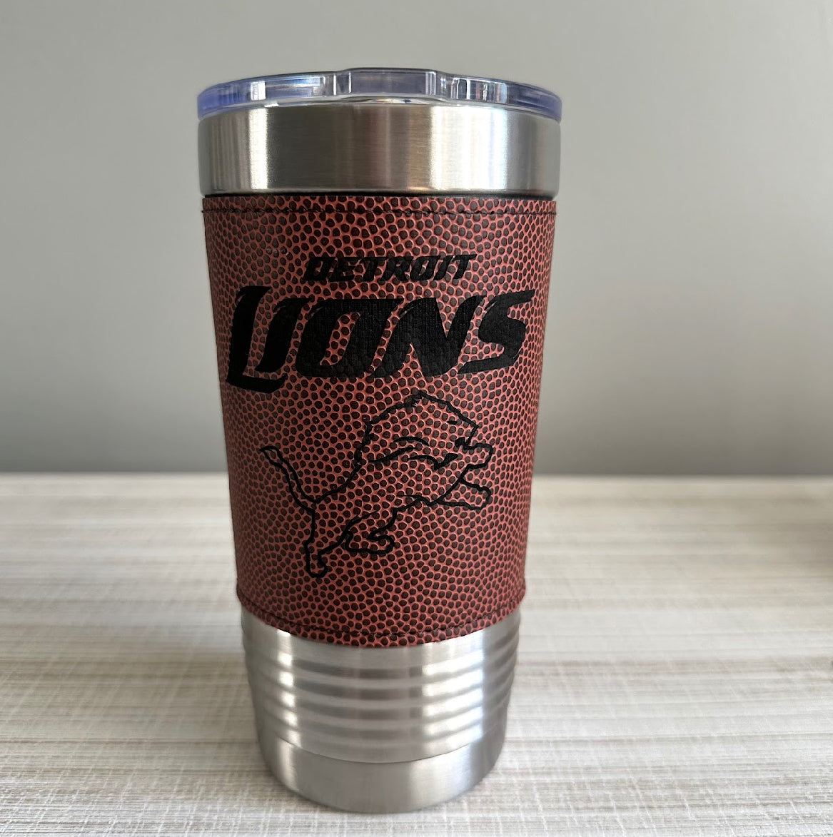 Lions 20 oz. Laser Engraved Tumbler with Lid and Football Textured Grip