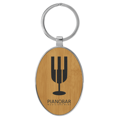 Bamboo 3" x 1 3/4" Laserable Leatherette/Metal Oval Keychain