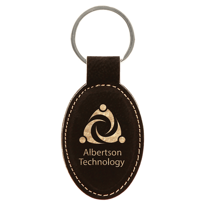 Black/Gold 3" x 1 3/4" Laserable Leatherette Oval Keychain