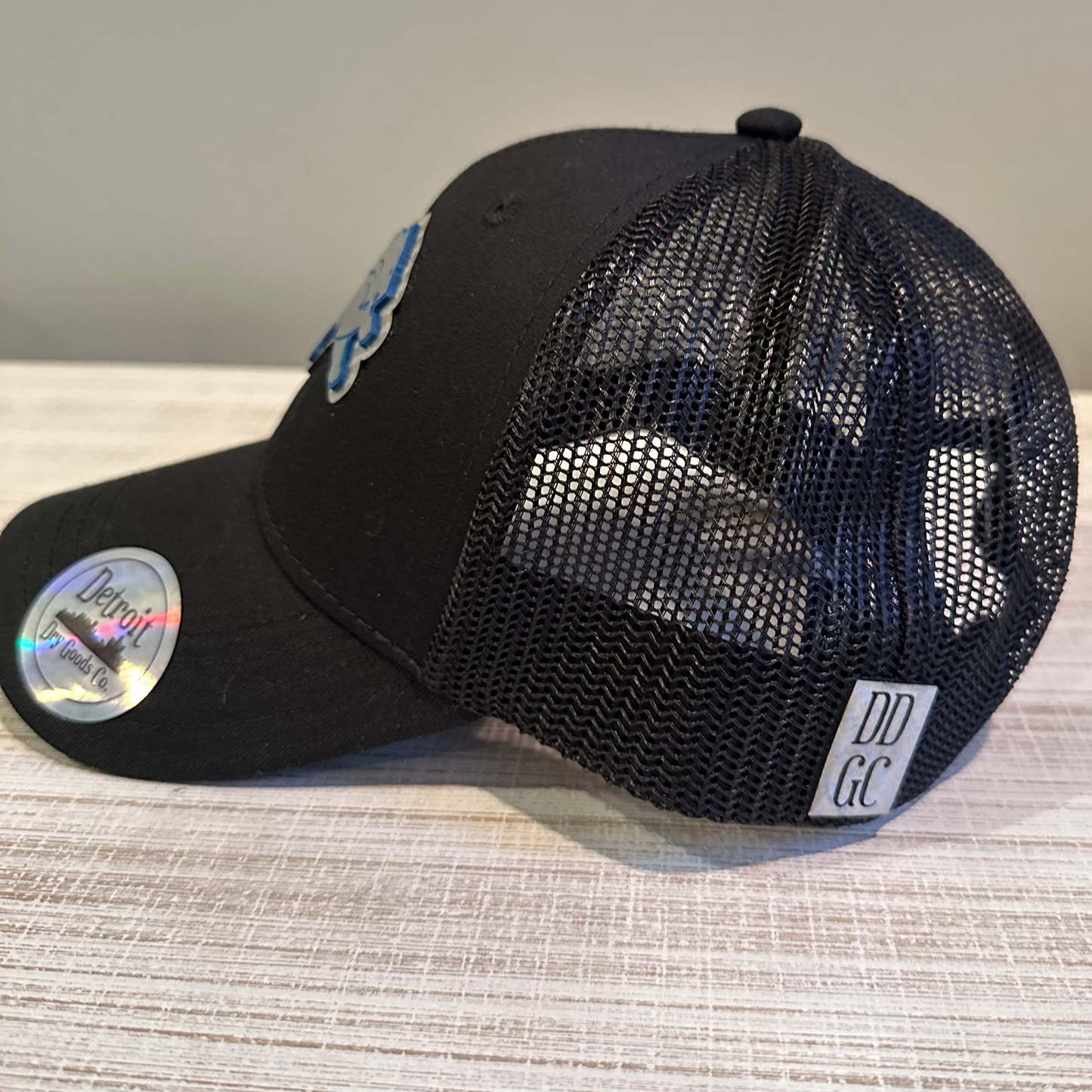 Lions Youth Trucker Hat – Black with Silver 3D Acrylic and Leatherette