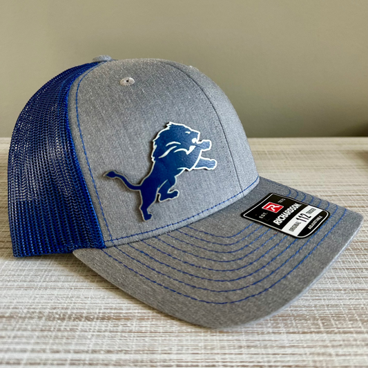 Lions Leatherette Patch Trucker Hat – Grey with Blue and Silver Patch