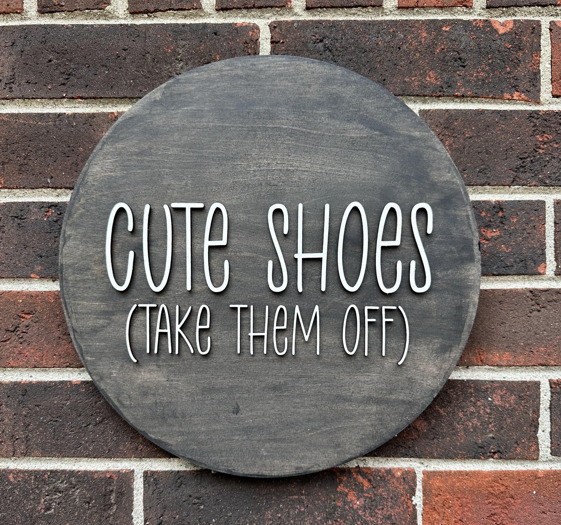 Cute Shoes - Take Them Off 12" Round Wood Entryway Sign - Detroit Dry Goods